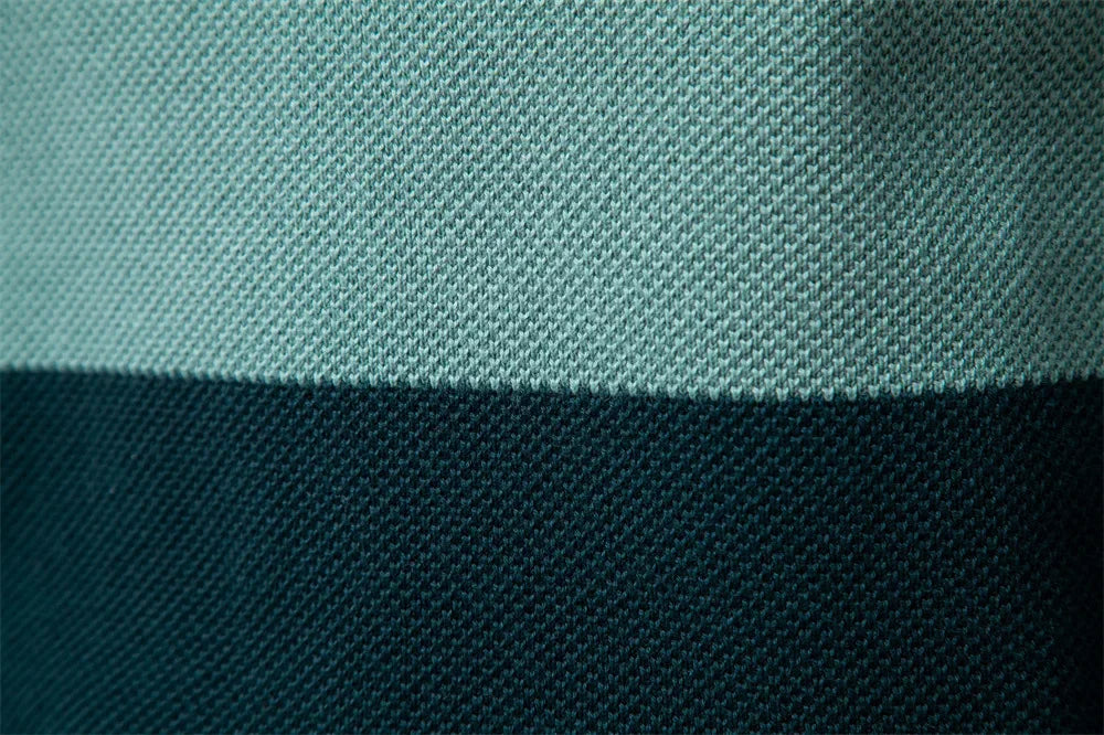 Half zip color block stickad sweater med ståkrage