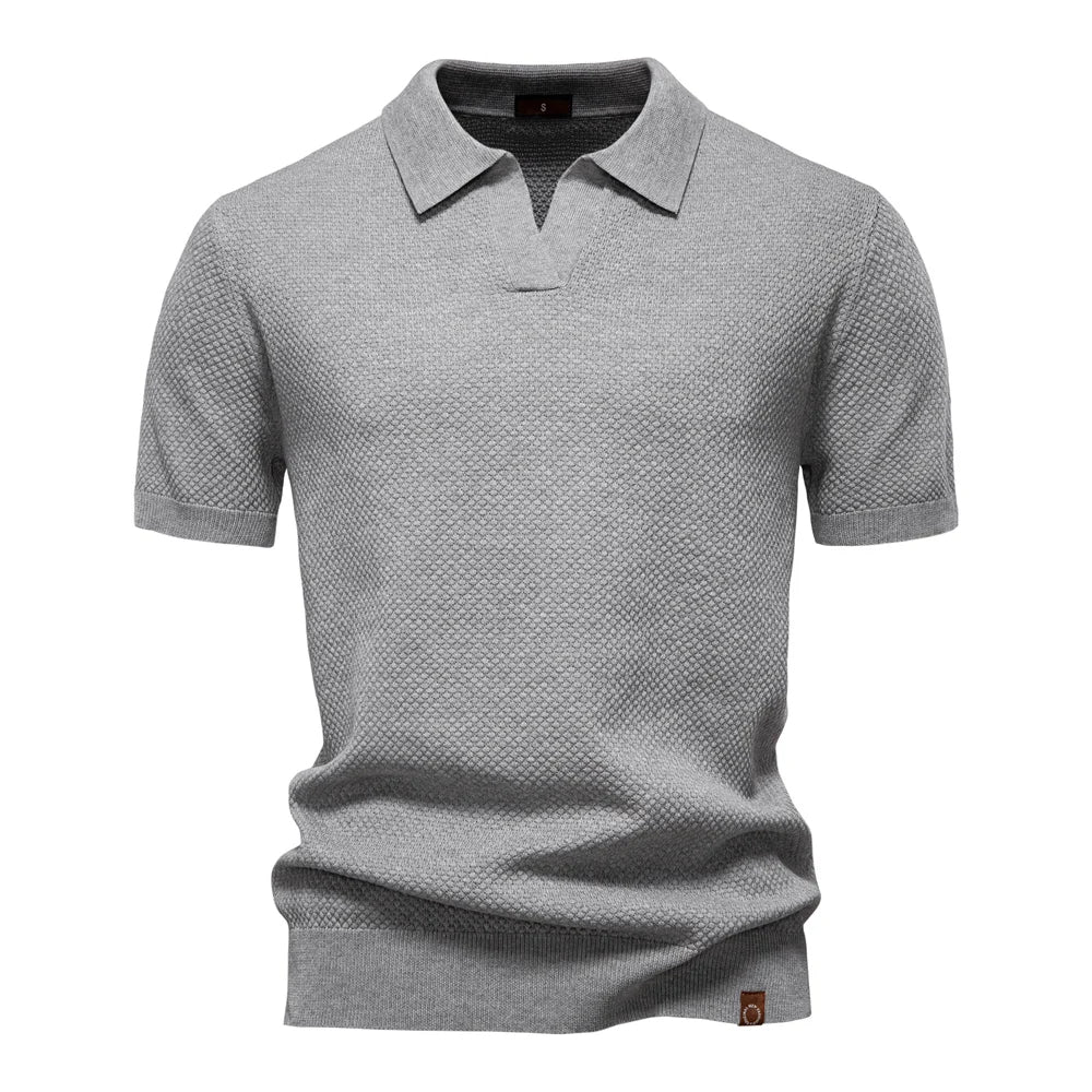 Kortärmad textured polo shirt med öppen knappslå krage