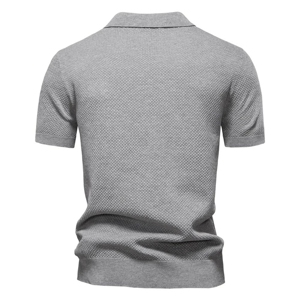 Kortärmad textured polo shirt med öppen knappslå krage
