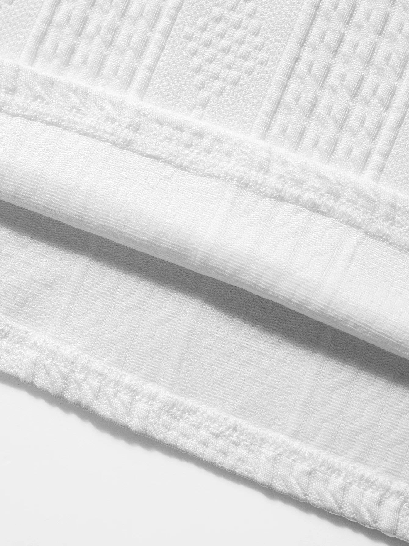 Textured cable knit half zip sweater med ståkrage